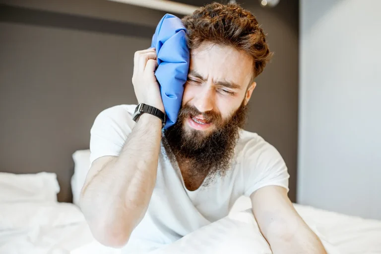 Patient following the wisdom teeth removal recovery timeline at home in Phoenix, AZ